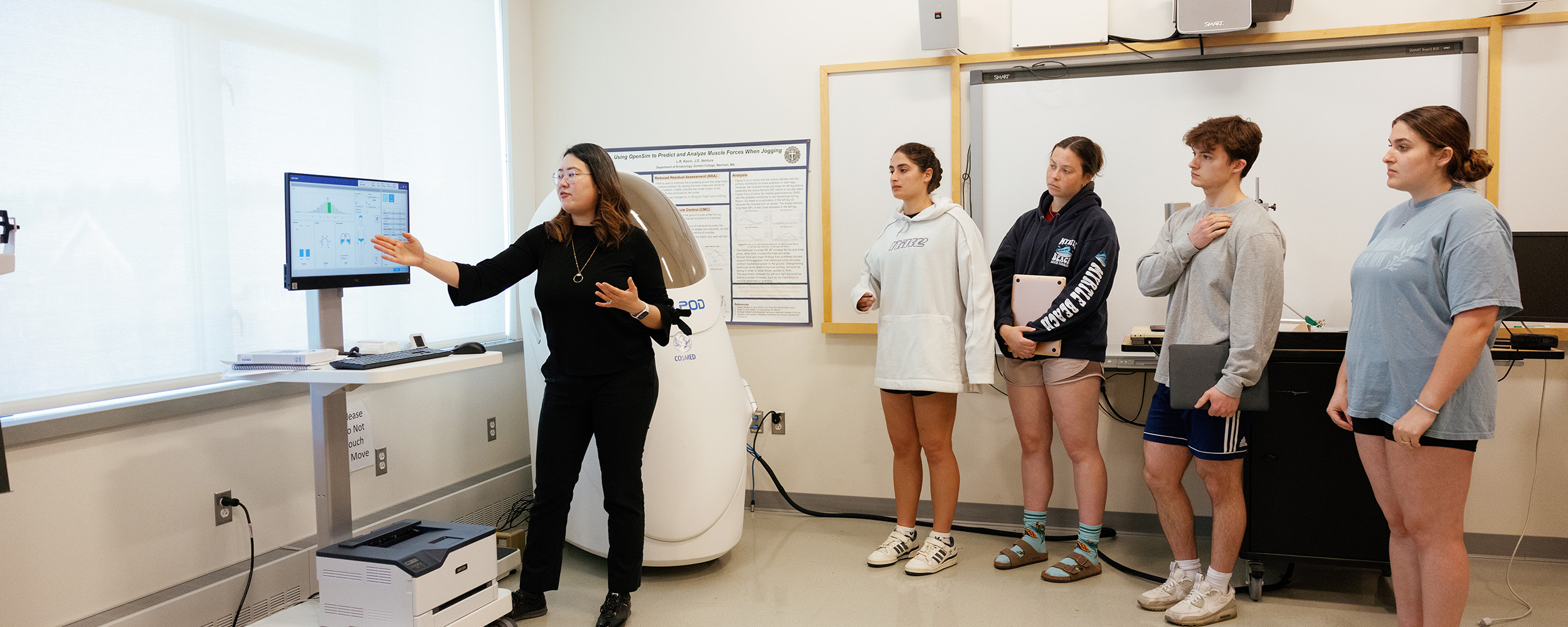 Students using BodPod in lab