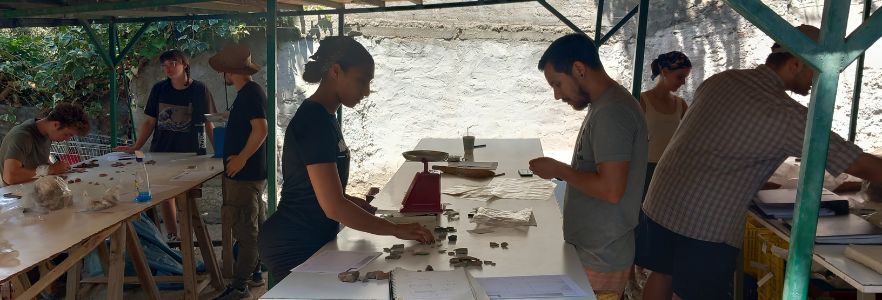 Students looking at artifacts