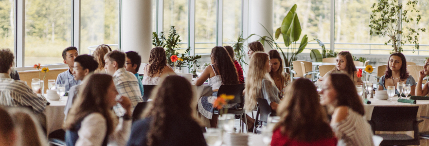 group discussions at tables inside